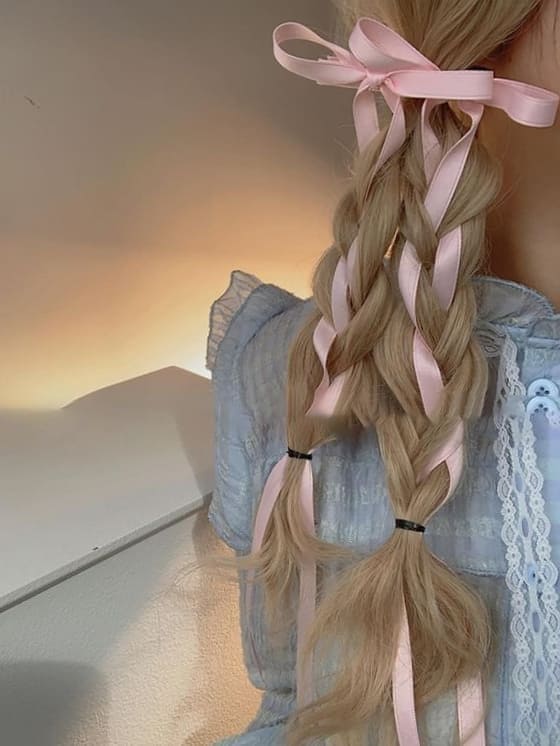 K-pop hairstyle with ribbons: multi braids a pony