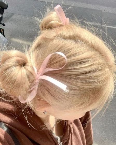 K-pop hairstyle with ribbons: space buns