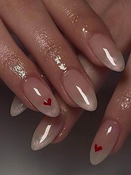 coquette nails: pearl white tops with hearts