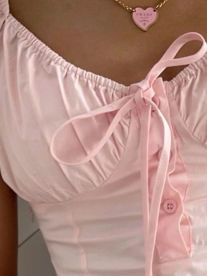 coquette aesthetic outfit: pink blouse