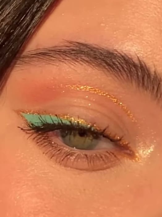 st. patrick's day makeup look: gold glitter liner