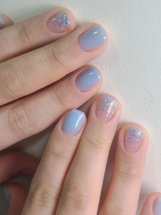 light blue nails: glitter accent 