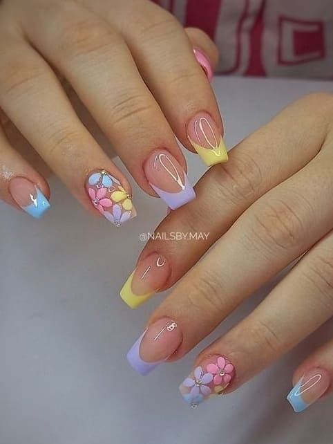easter nail design: pastel French tips with flowers 