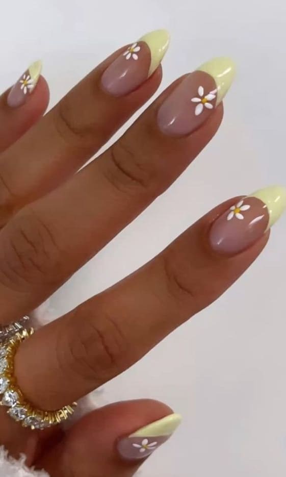 easter nail design: baby chic yellow tips with daisies 