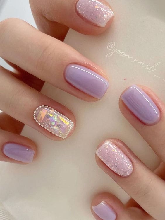 light purple nails: glitter and gems 