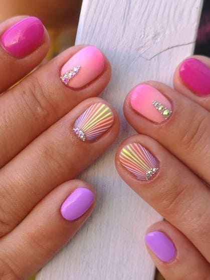 mermaid nail design: pink and purple 