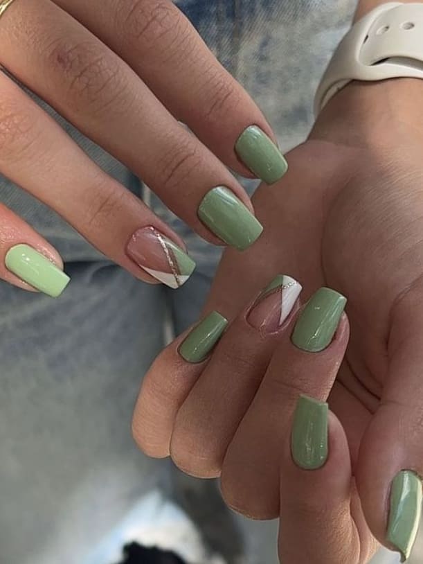 spring nail design: green nails with negative space 