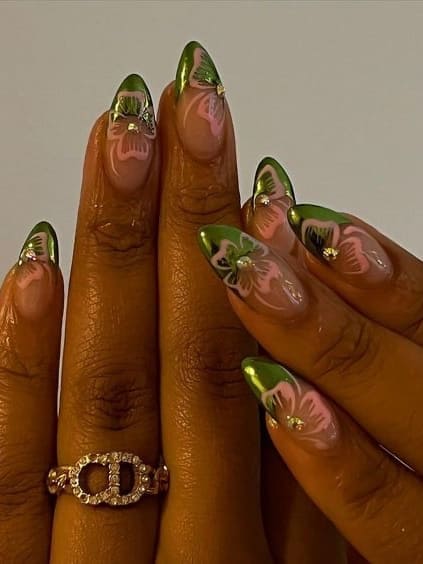 tropical nail design: chrome green French tips with Hawaiian flowers