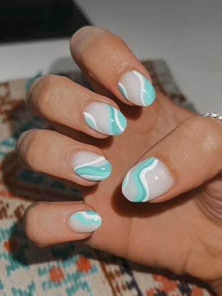 beach nail design: aqua blue swirls 