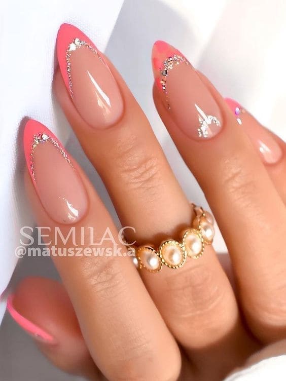 coral nail design: silver glitter French tips