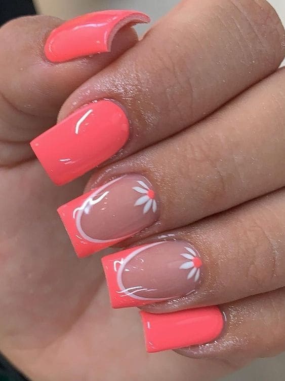 coral nail design: floral accent 