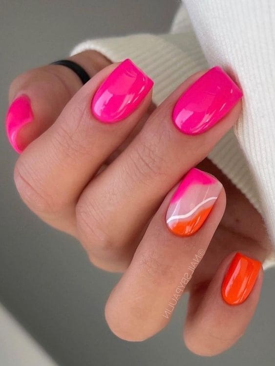 hot pink nails: orange negative space 