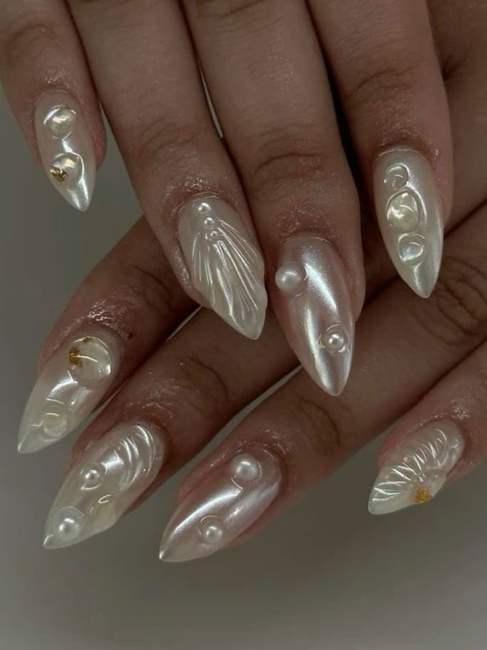 mermaid nail design: pearl white seashells