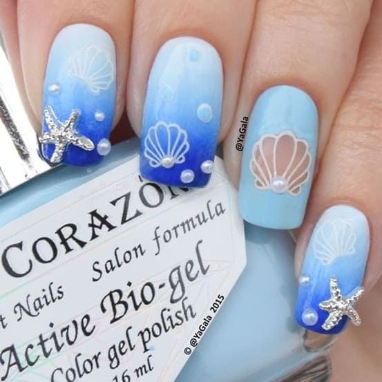 mermaid nail design: blue ombre with seashells 
