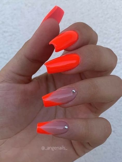 neon nail design: orange chevron tips