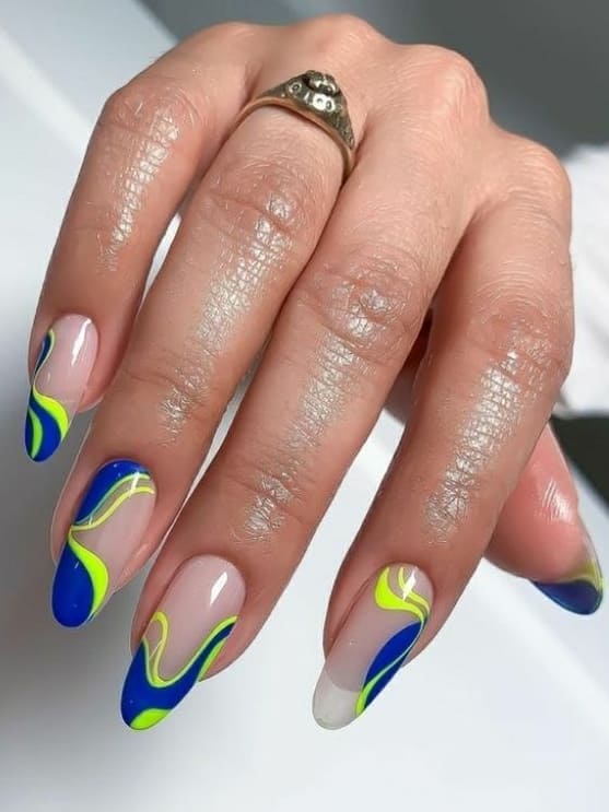 neon nail design: blue and yellow swirls 