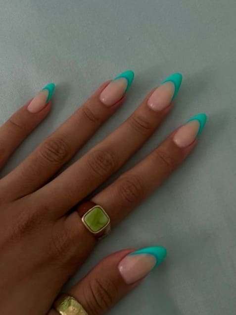 neon nail design: aqua blue French tips