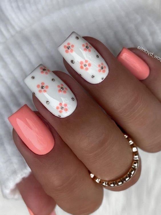peach nail design: tiny florals 