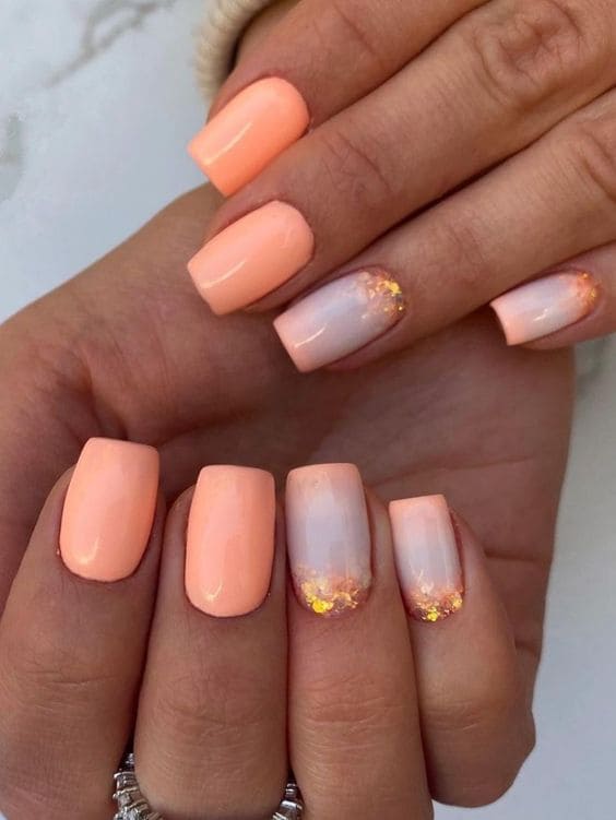 peach nail design: glitter 