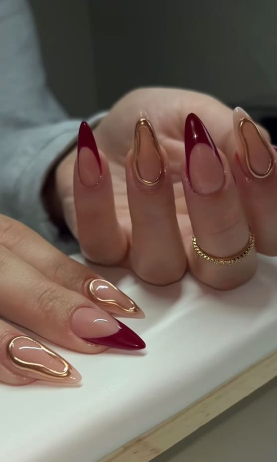 prom nails: burgundy and gold 