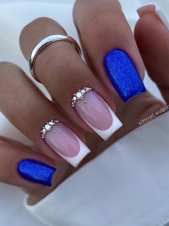royal blue nails: white French tips