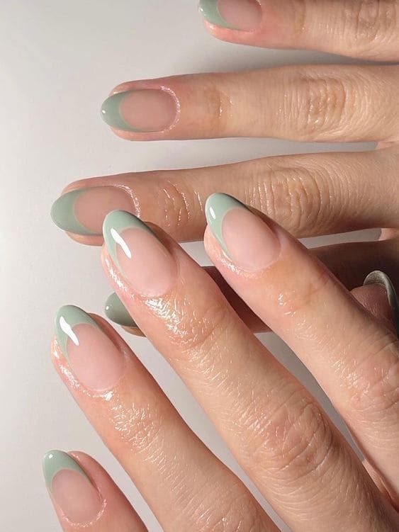 sage green nails: French tips