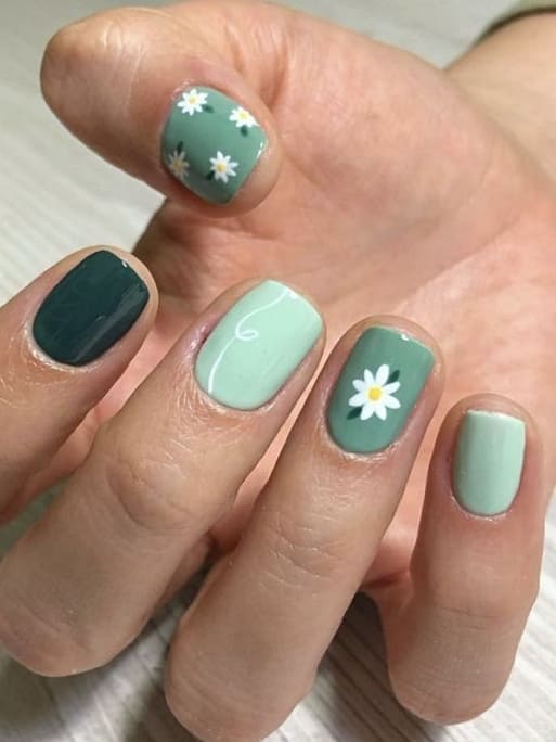 sage green nails: daisy