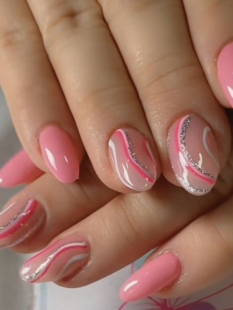 short summer nails: pink jelly nails with swirls 
