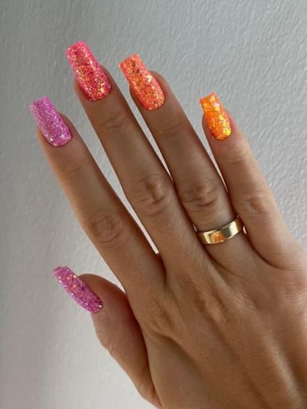 tropical nail design: chunky glitter pink and orange