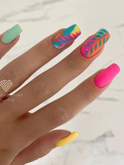 tropical nail design: neon colors with leaves