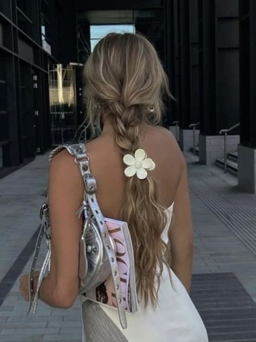 vacation hairstyle: braid with a floral hair claw