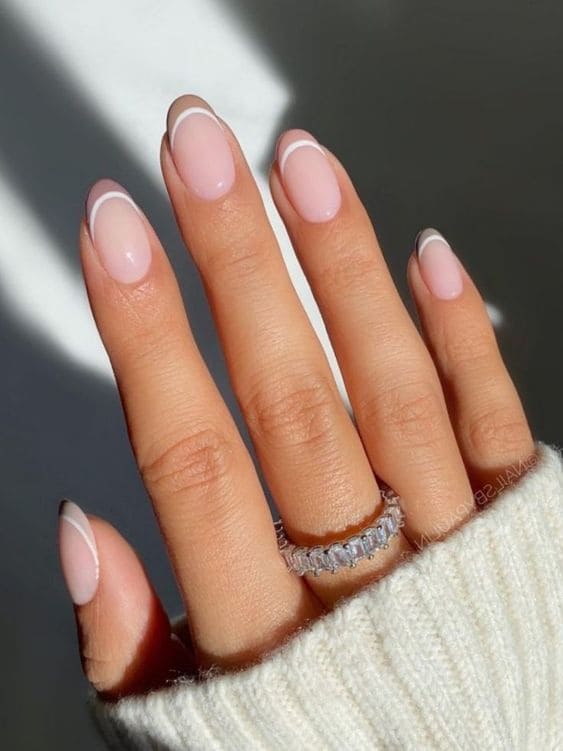 brown nail design: double French tips