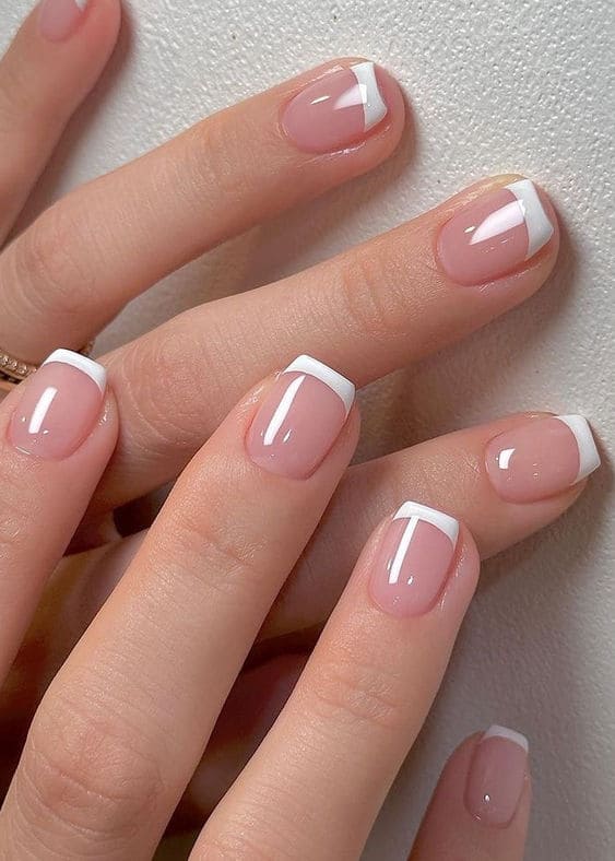 white nail design: short French tips
