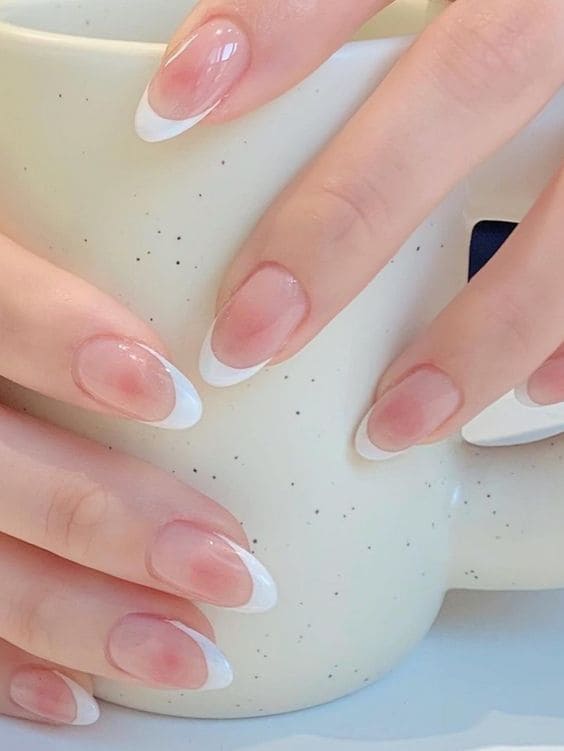 white nail design: blushed French tips