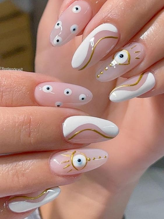 white nail design: quirky eyes