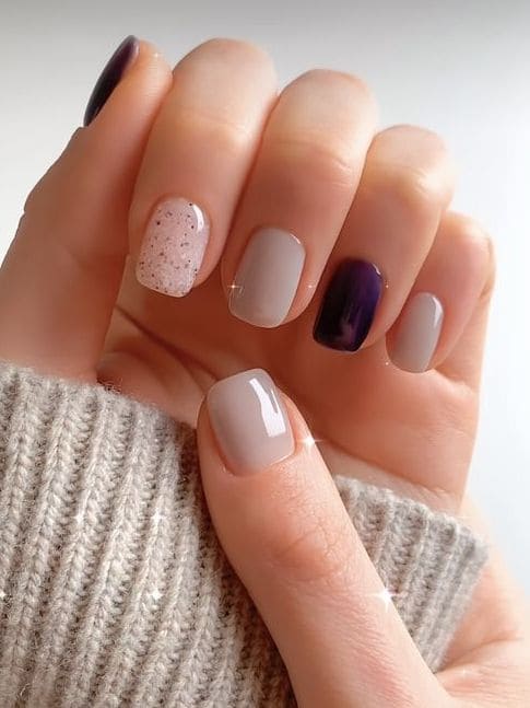 winter nail color: deep purple accent 